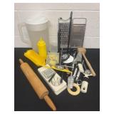 Group of kitchen items: paper towel holder,
