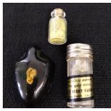 Vintage containers of gold pieces, flakes and dust