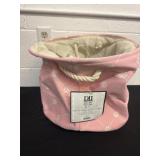 1 medium 12'x15' round cloth bin.