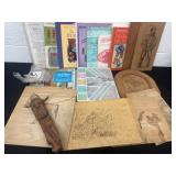 Group of wood art, beads and embroidery books