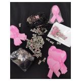 Large group of breast cancer pins, lanyards and