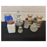 Group of glass shakers, perfume bottle and jar
