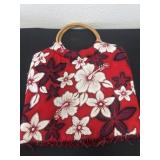 Floral had bag with bead strands