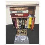 Group of vhs and DVDs.