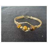 handcrafted wire-wrapped bracelet featuring