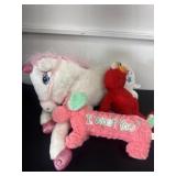 Elmo unicorn and wiener dog plushies