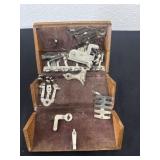 antique Singer sewing machine attachments
