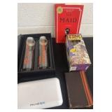 Water bottle, book, stak attack and phone spa