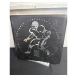 Binder of football cards