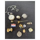 Pocket watch with pins and necklace pendants