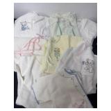 Group of vintage baby clothes