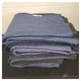 3 moving blankets.