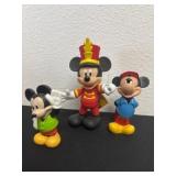 3 Mickey more vinyl figurines.