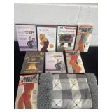 Group of fur muff and yoga dvd vhs