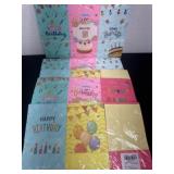 Group of happy birthday paper bags