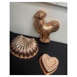 3 vintage copper molds.