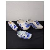 Four porcelain wooden shoes one is a Blue delfts
