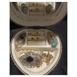 Sun design jewelry box with jewelry