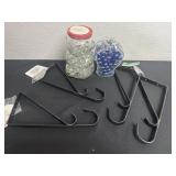 Garden hooks and jar of decor marbles
