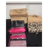 4 new travel cosmetic bags one is  Mary Kay