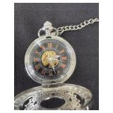 vintage-style mechanical pocket watch features a