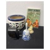 Boy Scout hand book, planter, bell and pencil