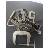 Group of c clamps.