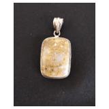 Vintage sterling silver pendant with natural