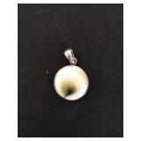 Vintage sterling silver Shiva eye shell pendant