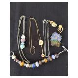 Group of necklaces, one needs repaired. Pins,
