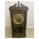 vintage Centurion wall clock featuring a golden