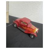1932 Ford Deuce Coupe model features bright