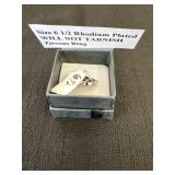Size 6 1/2 rhodium plated will not tarnish