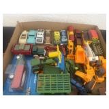 Group of cars and construction toys