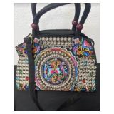 embroidered black handbag