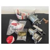 Group of fishing items and reels