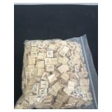 Bag of wood scrabble letter