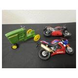 Honda motorcycle toy and John deer toy