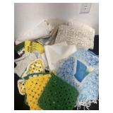 Group of doilies and hot pads.