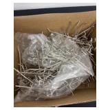 Box of pegs for peg board