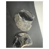 raw black obsidian stones