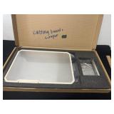 Cutting board and scrapper