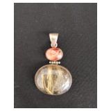 Vintage sterling silver pendant with oval