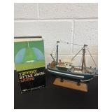 Tiffany style swag lamp and wood ship