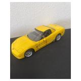 18 scale diecast model of a yellow 2001 Chevrolet