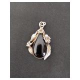 Vintage sterling silver pendant with teardrop