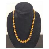 22 inch sterling silver tigers eye necklace.