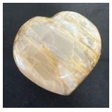 3ï¿½ polished gemstone in the shape of a heart,