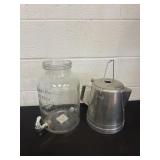 Glass drink dispenser and aluminum teapot
