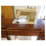 Singer Sewing Machine in Cabinet